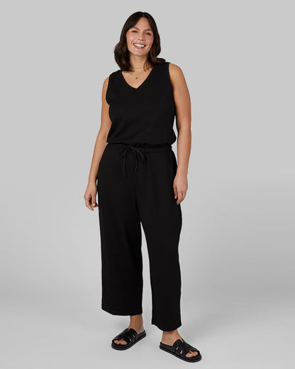 WOMEN'S STUDIO TECH JUMPSUIT