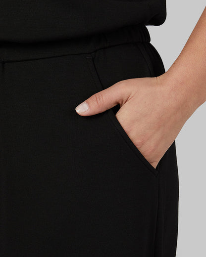 WOMEN'S STUDIO TECH JUMPSUIT