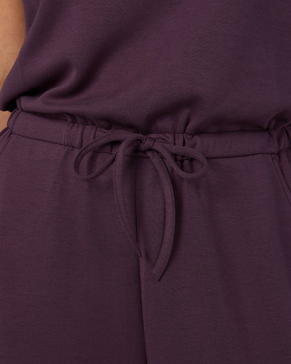 WOMEN'S STUDIO TECH JUMPSUIT